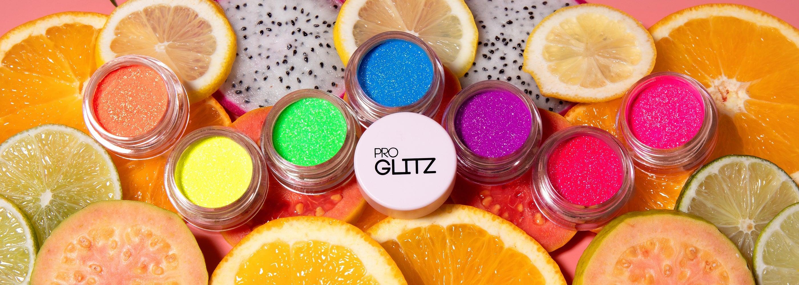 neon eyeshadow, uv glow neon, uv neon, eyeshadow, neon eye makeup, neon pink, neon green, neon orange, pro glitz neon, proglitz, neon festival look, neon fashion