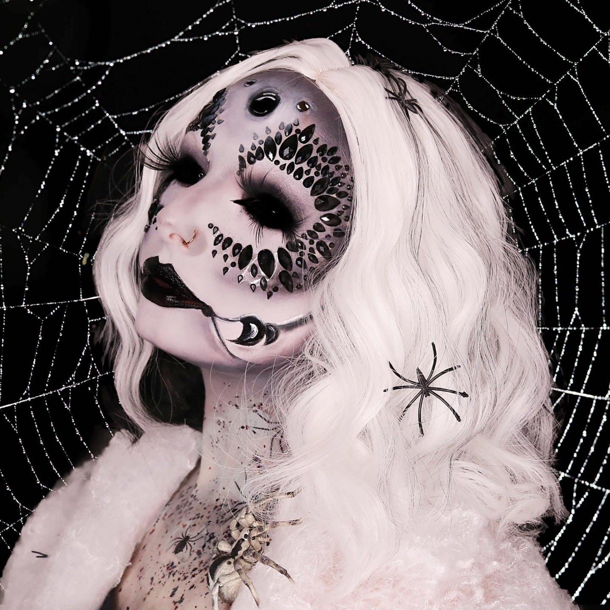 Get The Black Widow Look, Black Widow, black widow makeup, halloween makeup, dress up makeup, black face jewel, black face gems, black hair jewel, spider tattoos, temporary tattoos, tattoo transfers, halloween temporary tattoos, halloween glitter, chunky glitter, black and red glitter, proglitz, pro glitz, festival glitter, festival makeup, festival looks, festival trends, halloween looks, best makeup, uk, halloween ideas, festival face and body gems jewels