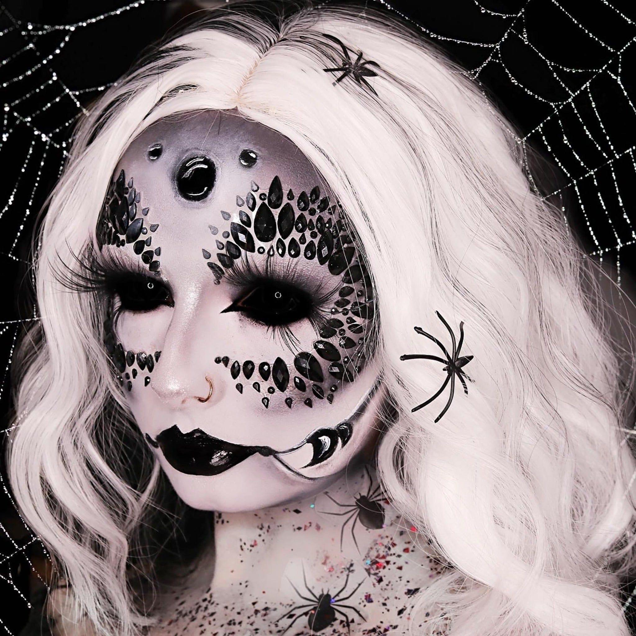 Get The Black Widow Look, Black Widow, black widow makeup, halloween makeup, dress up makeup, black face jewel, black face gems, black hair jewel, spider tattoos, temporary tattoos, tattoo transfers, halloween temporary tattoos, halloween glitter, chunky glitter, black and red glitter, proglitz, pro glitz, festival glitter, festival makeup, festival looks, festival trends, halloween looks, best makeup, uk, halloween ideas, festival face and body gems jewels